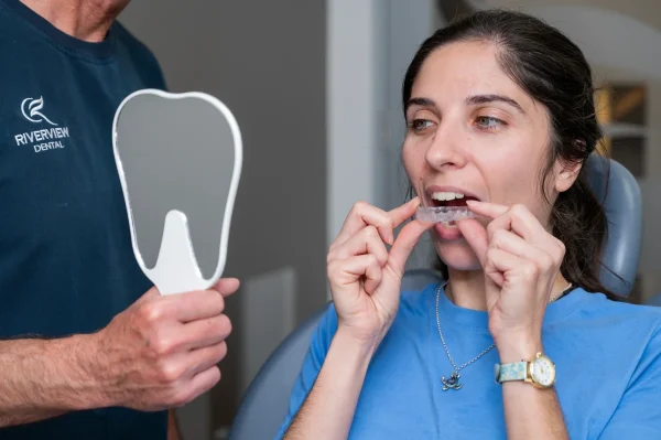 dr stuart malone showing patient whitening gel riverview dental shepparton vic 184
