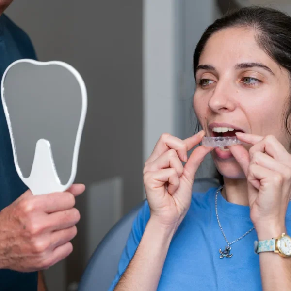 dr stuart malone showing patient whitening gel riverview dental shepparton vic 184